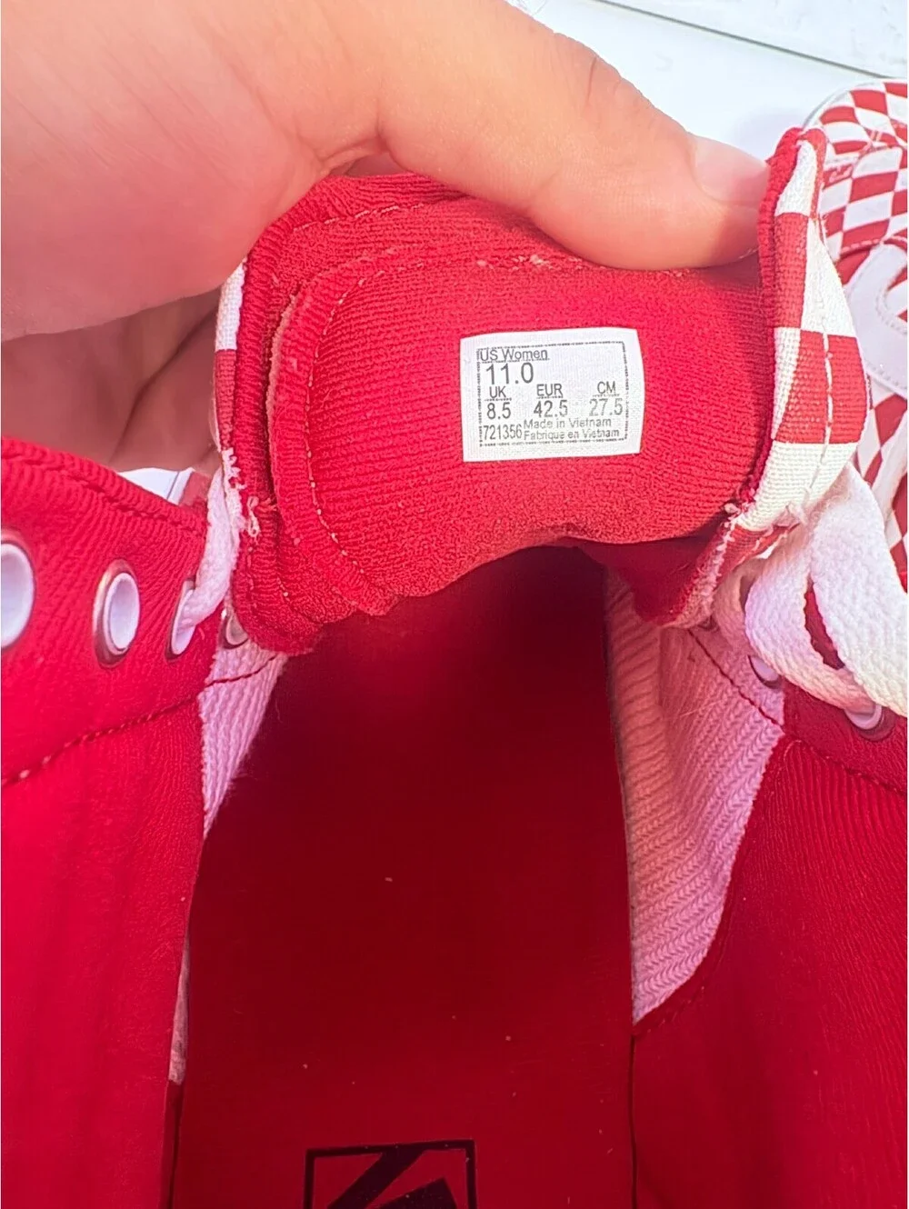 Vans red and white checkerboard high top sneakers